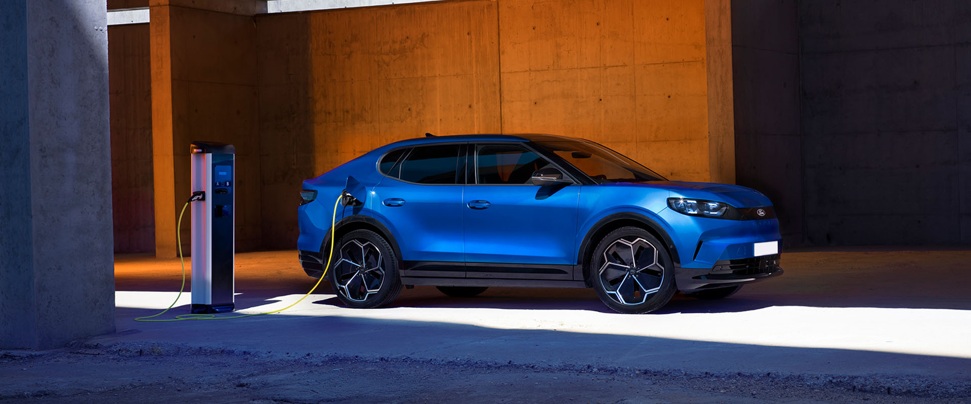 Blue Electric car on charge